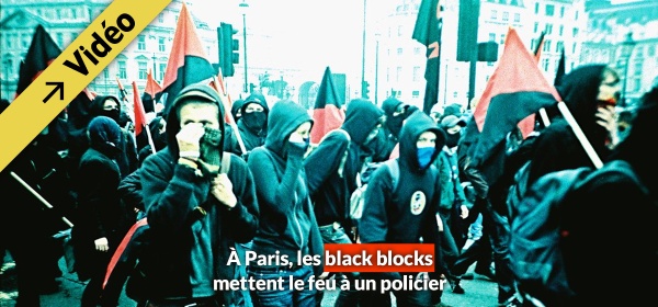 À Paris, les black blocks mettent le feu à un policiers